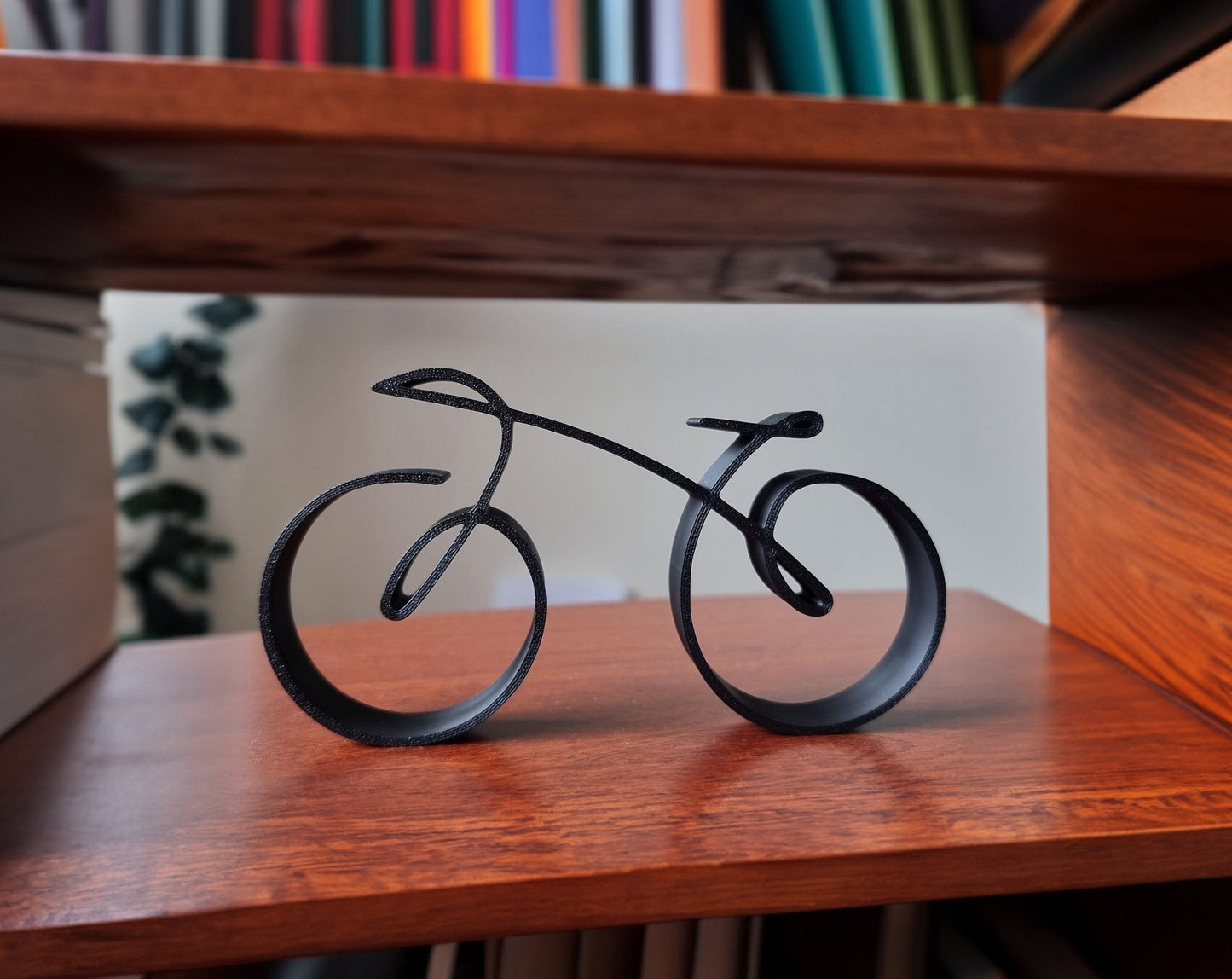 Wearclo | Elegant minimalist bicycle sculpture wireframe style