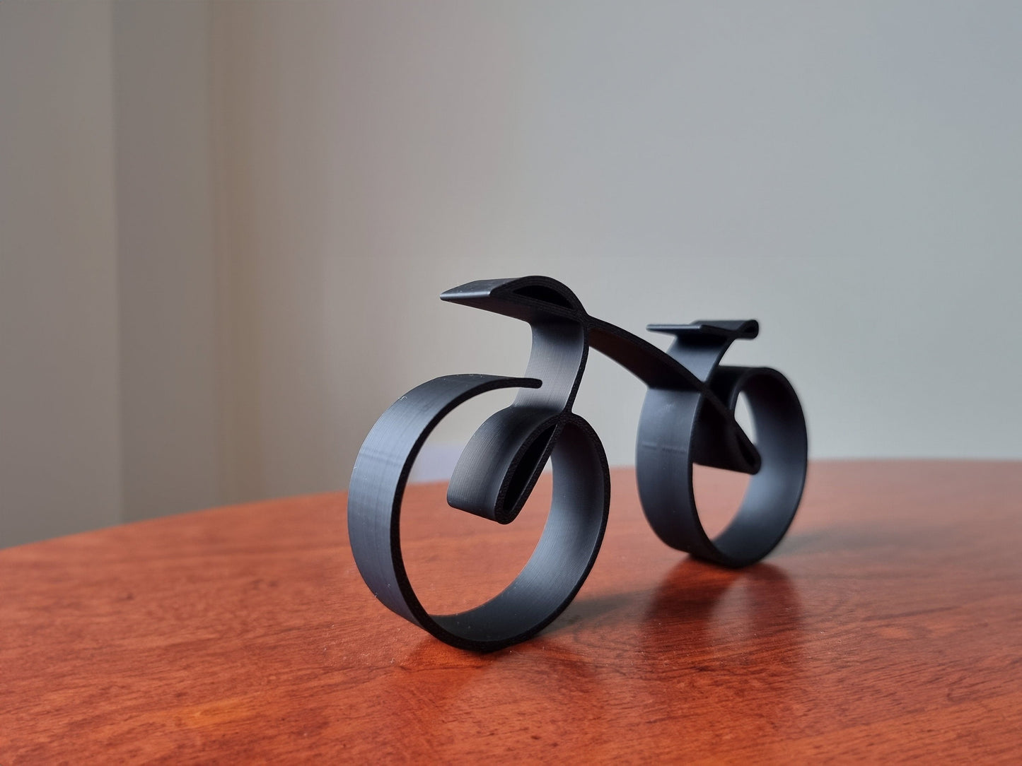 Wearclo | Elegant minimalist bicycle sculpture wireframe style