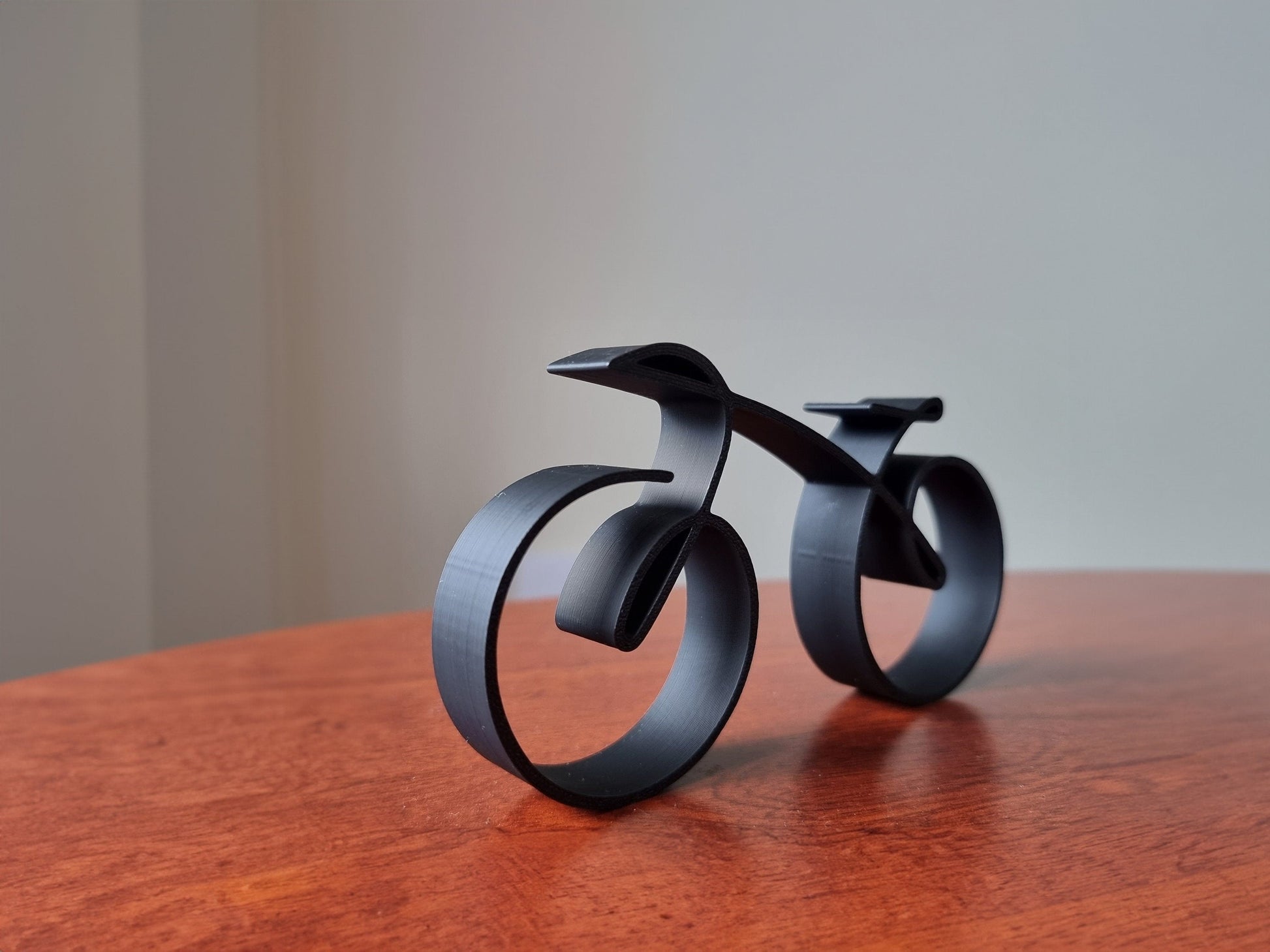 Wearclo | Elegant minimalist bicycle sculpture wireframe style