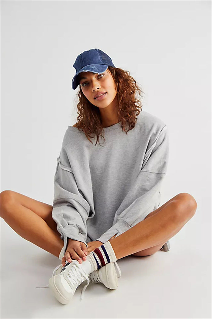 Women's Oversized Sweatshirt with Balloon Sleeves, Exposed Seams, and Side Slits