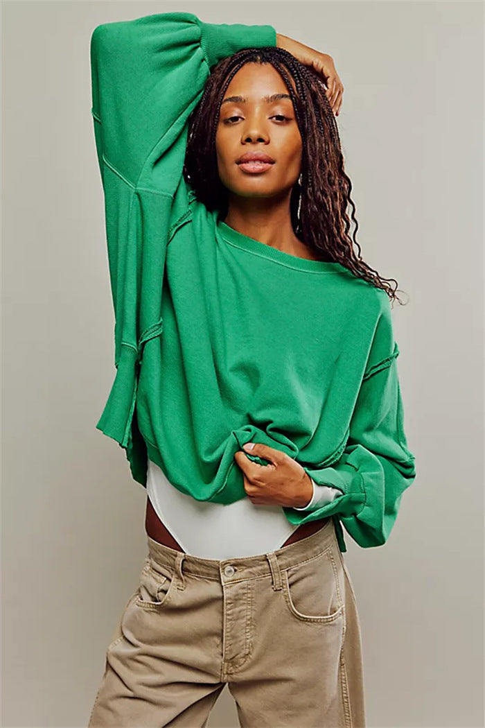 Women's Oversized Sweatshirt with Balloon Sleeves, Exposed Seams, and Side Slits