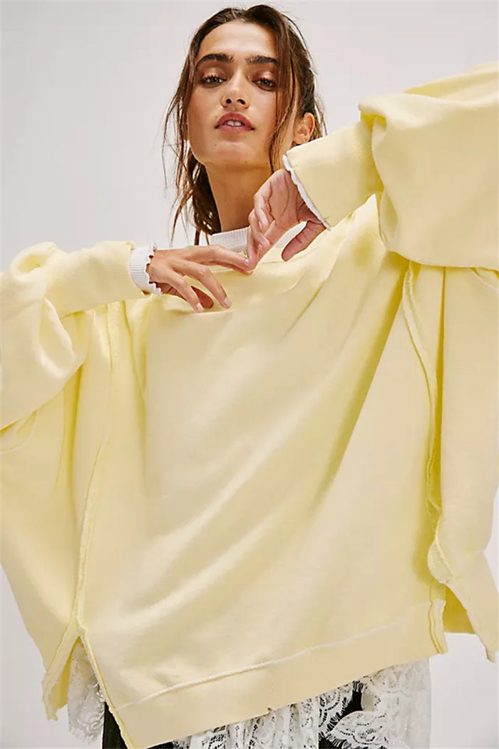 Women's Oversized Sweatshirt with Balloon Sleeves, Exposed Seams, and Side Slits